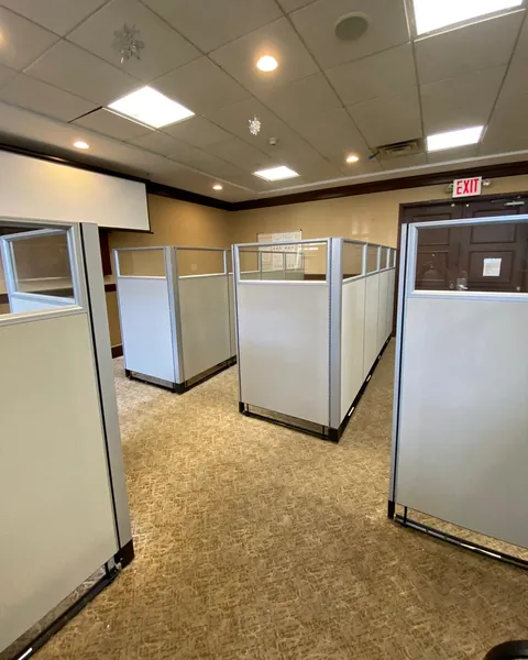 Rows of glass-top cubicles installed